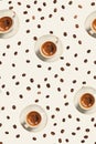 Seamless pattern of espresso cups surrounded by roasted coffee beans on a light background, ideal for kitchen decor