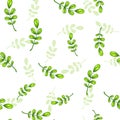 Seamless pattern with falling green leaves.