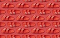 Seamless Pattern of Fashionable beach coral birkenstock on bright coral background. Flat lay top view copy space. Creative beach Royalty Free Stock Photo