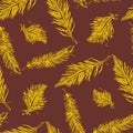 Seamless Pattern with Feathers yellow on a brown background. Royalty Free Stock Photo