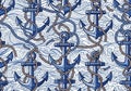 Seamless pattern featuring blue anchors intertwined with brown Royalty Free Stock Photo