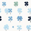 Seamless pattern featuring various shades of blue and green shamrocks on light background, creating fresh and cheerful vibe Royalty Free Stock Photo