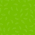 Seamless pattern. Flat small leaves on a green background.