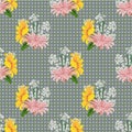 Seamless pattern with floral print. Cute garden flowers on polka dot background. Royalty Free Stock Photo