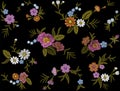 Seamless pattern of flovers on a black background. Imitation embroidery. Royalty Free Stock Photo