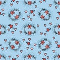 Seamless pattern with flowers and hearts on doodle style in blue background