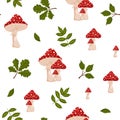 Seamless pattern of fly agarics and green leaves white background