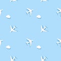 Seamless pattern of flying planes and clouds on blue background Royalty Free Stock Photo