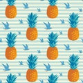 seamless pattern with flying seagulls and pineapples on a striped backdrop