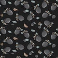 Seamless pattern with footprints and pebble