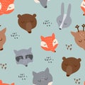 Seamless pattern forest animals including bear, wolf, deer, hare, fox and raccoon