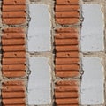 Seamless pattern of fragment of red and white stone wall Royalty Free Stock Photo