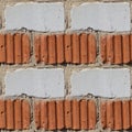 Seamless pattern of fragment of red and white stone wall Royalty Free Stock Photo