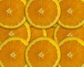 Seamless pattern of fresh orange slices, tangerine slices background
