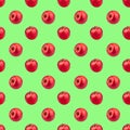 Seamless pattern of fresh red apples on green background isolated, bright shiny apple repeating ornament, tasty juicy ripe fruits Royalty Free Stock Photo