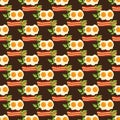 Seamless pattern with fried egg, herbs and slices of bacon on a brown background Royalty Free Stock Photo