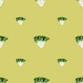 Seamless pattern frisee salad on beige background. Simple ornament with lettuce