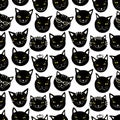 Seamless pattern with funny black cats muzzles set. Hand drawn cute kittens head clip art. Royalty Free Stock Photo