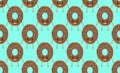 Seamless pattern with funny character donut with frosting, vector illustration in cartoon style. Cute smiley fresh donut Royalty Free Stock Photo