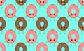 Seamless pattern with funny character donut with frosting, vector illustration in cartoon style. Royalty Free Stock Photo
