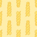 Seamless pattern of Fusilli paste, yellow in flat style on a yellow background. a kind of dry short pasta twisted into a spiral. Royalty Free Stock Photo