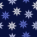 Seamless pattern of geometric white light blue snowflakes stars on dark blue background. Flat style winter holiday and Happy New Royalty Free Stock Photo