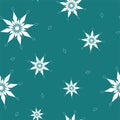 Seamless pattern of geometric white snowflakes and rhombus different sizes on green background. Flat style winter holiday and Royalty Free Stock Photo