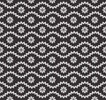 Seamless pattern with geometric zigzag and small flowers, snowflakes, stars. Abstract black and white texture. Simple Royalty Free Stock Photo