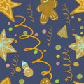 Seamless pattern with ginger biscuits of christmas shapes, golden tinsel, serpentine on blue background. Hand drawing holidays coo Royalty Free Stock Photo