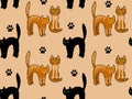 Seamless pattern with ginger and black cats on a delicate beige background Royalty Free Stock Photo