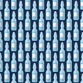 Seamless pattern with glass ampules. Icons, isolated on dark blue background Royalty Free Stock Photo