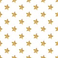 Seamless pattern of glittering gold stars