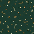 Seamless pattern of gold balls and stars ornaments on a green background. Christmas and New Year gifts wrapping paper template. Royalty Free Stock Photo