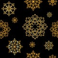 Seamless pattern with Golden snowflakes on black