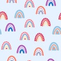 Seamless pattern graceful rainbows in boho colors. Scandinavian baby hand style for newborns.