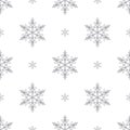 Seamless pattern of gray snowflakes on a white background Royalty Free Stock Photo