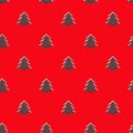 Seamless pattern with green christmas trees on a red background. Isometric concept. New Year and Christmas background Royalty Free Stock Photo