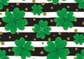 Seamless pattern with green clover leaves, gold gitter textured polka dots, stripes. Royalty Free Stock Photo