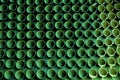 Seamless pattern of green earthen pots kept in linier position.