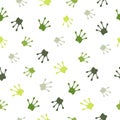 Seamless pattern with green frog footprints. Animal foot colorful icon