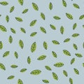 Seamless pattern of green leaves on a blue background. Strict flat design. Geometric location. Printing on fabric Royalty Free Stock Photo