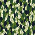 Seamless pattern from green leaves on a solid background. Strict flat design. Geometric location. Printing on fabric Royalty Free Stock Photo