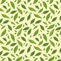 Seamless pattern with green leaves on a yellow background. Natural ornament Royalty Free Stock Photo