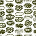 Seamless pattern with green ornamental leaves.