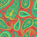 Seamless pattern with green Paisley motifs on red background