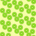 Seamless pattern with green tasty kiwi split on circles