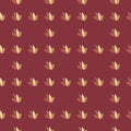Seamless pattern with grid located leaves on burgundy background. Botanic design in scandinavian style