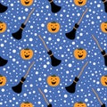 Seamless pattern for Halloween. Happy pumpkins with brooms on a blue background. Cute vector illustrations for holiday Royalty Free Stock Photo