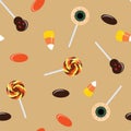 Seamless pattern with Halloween sweets. Corn candy, lollipops an