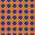 Seamless pattern in Halloween traditional colors. Repeated diamonds background. Checkerboard wallpaper.